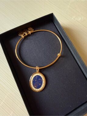 Alex and Ani Gold Bracelet with Blue Aries Zodiac Pendant